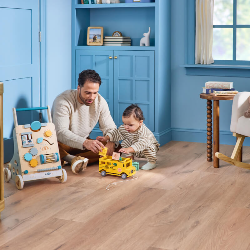 Dad child playing | Sterling Carpet & Flooring